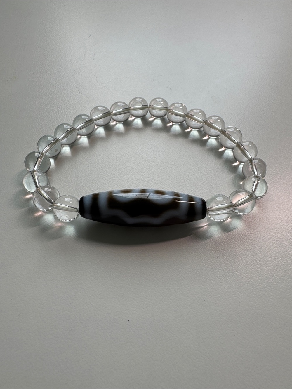 Crystal Bead Bracelet with Black and White Patterned Dzi Accent